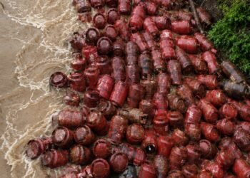 Gas Cylinder Found Floating in Floodwaters